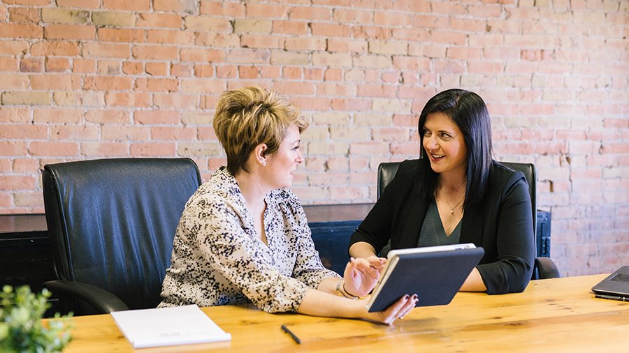 woman coaching another business woman